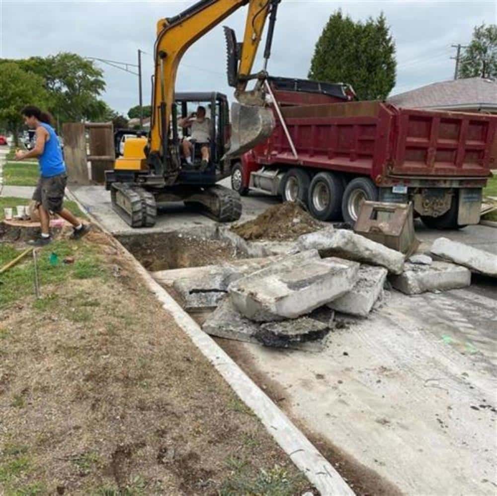 Bison Plumbing sewer repair crew working on a Macomb County residential job site