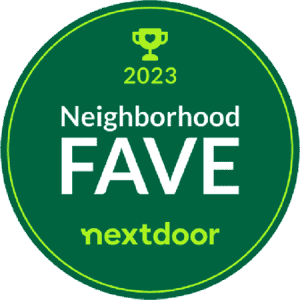 Green circular badge with a trophy icon and 2023 at the top, Neighborhood FAVE in bold white text in the center, and nextdoor in light green at the bottom.