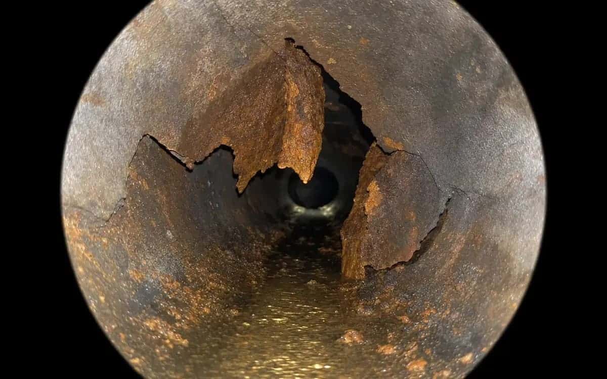 Partial cast-iron pipe collapse at 28 feet — Warren, MI sewer lateral