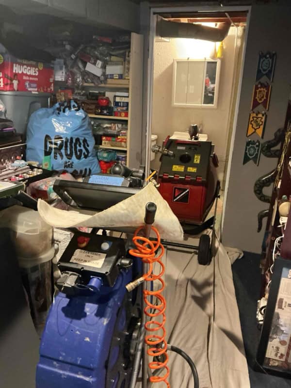 CIPP pipe lining equipment staged inside the home for trenchless sewer repair in Sterling Heights, MI